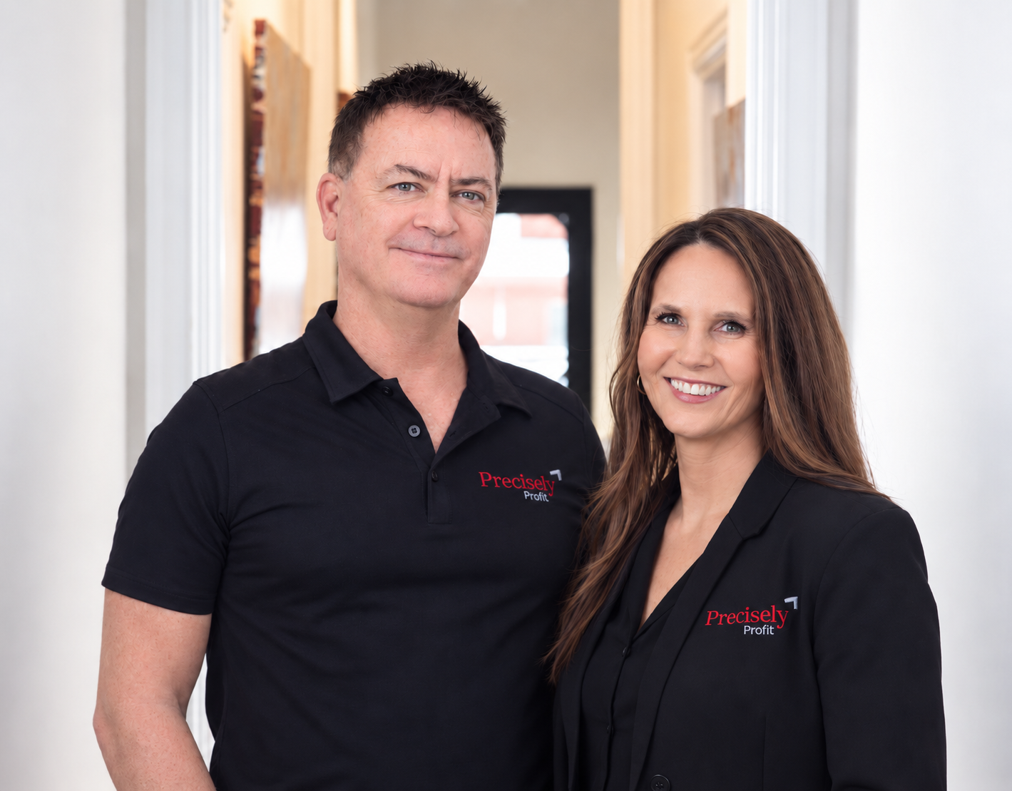 David and Lynda Hall of Precisely Profit standing together